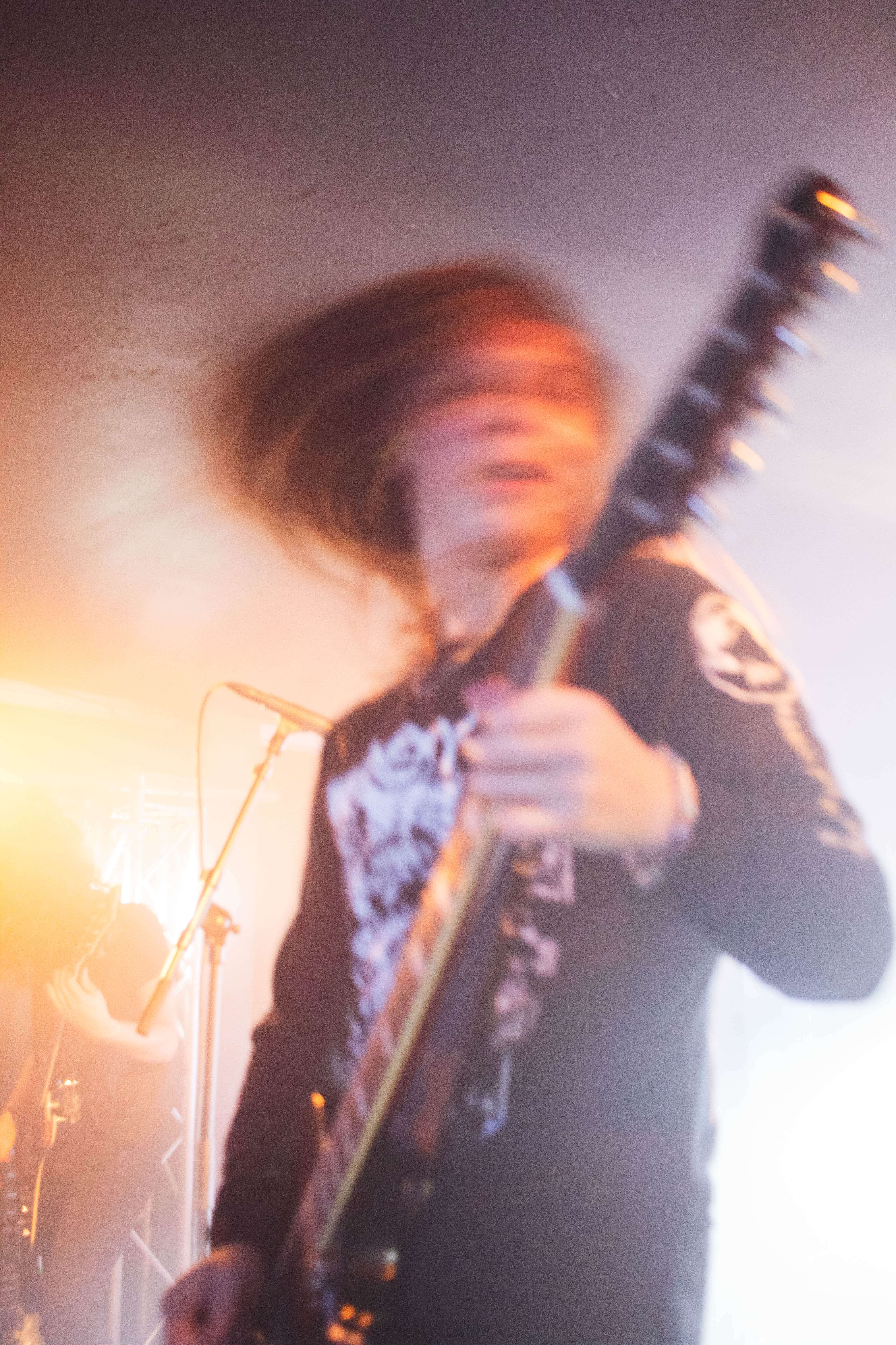 Photo d'un guitariste lors d'un concert