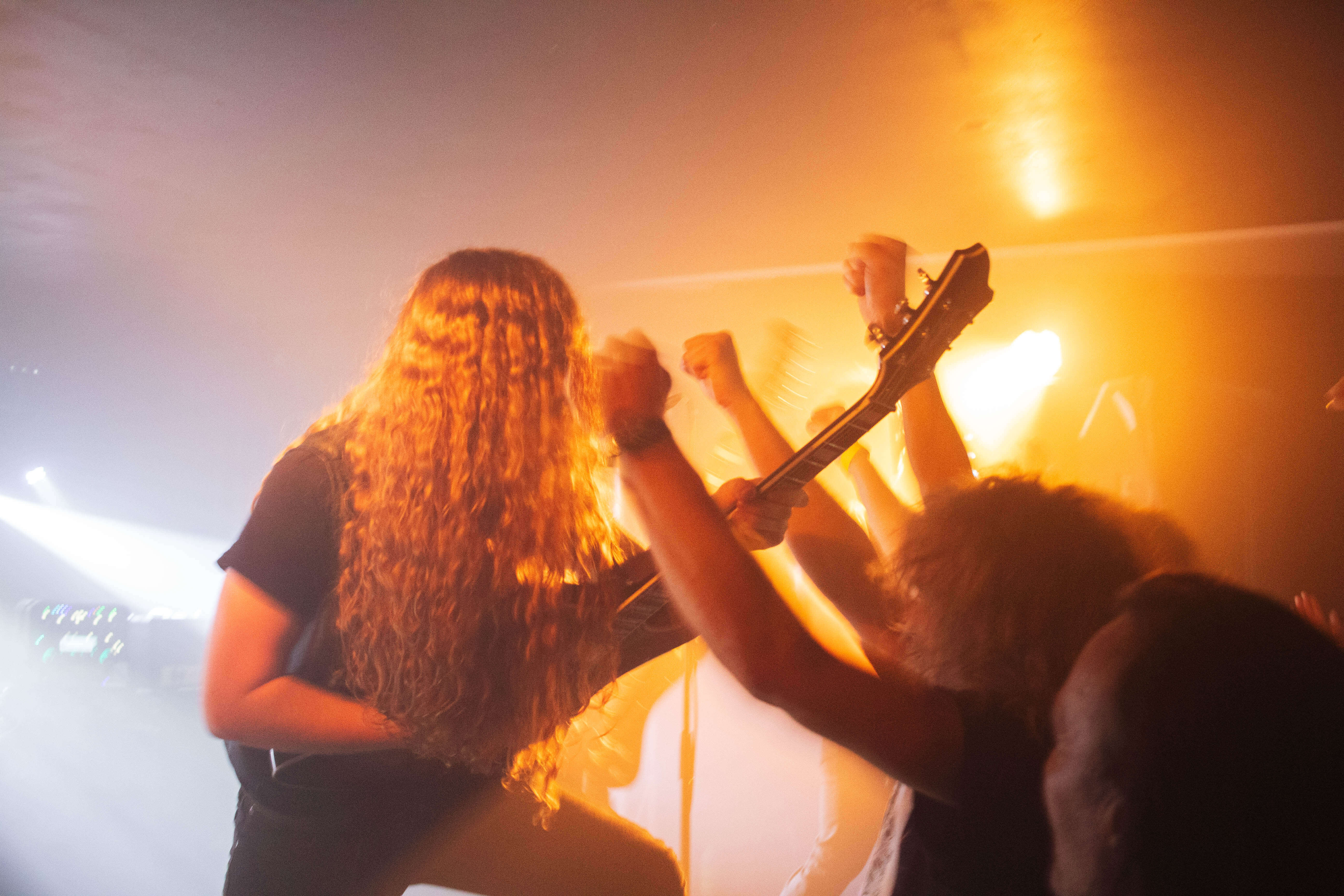 Photo d'un guitariste lors d'un concert